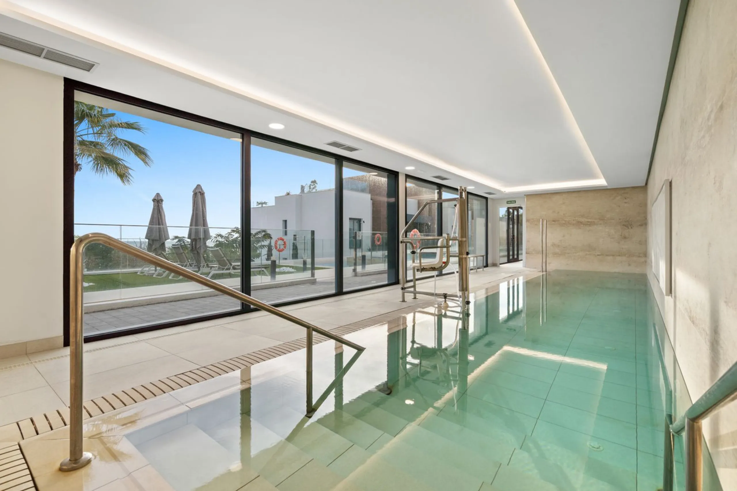 Absolutely stunning, spacious, bright and totally  luxurious   apartment with private garden and pool, enjoying panoramic seaviews.