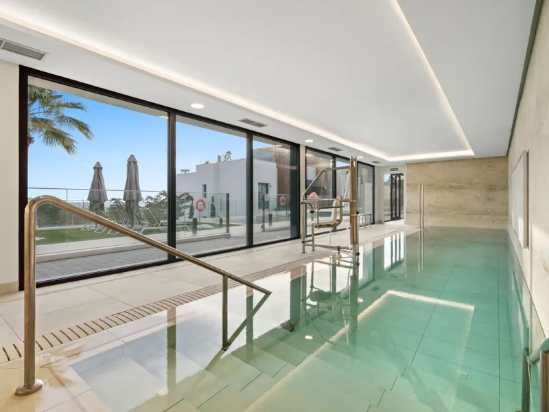 Absolutely stunning, spacious, bright and totally  luxurious   apartment with private garden and pool, enjoying panoramic seaviews.