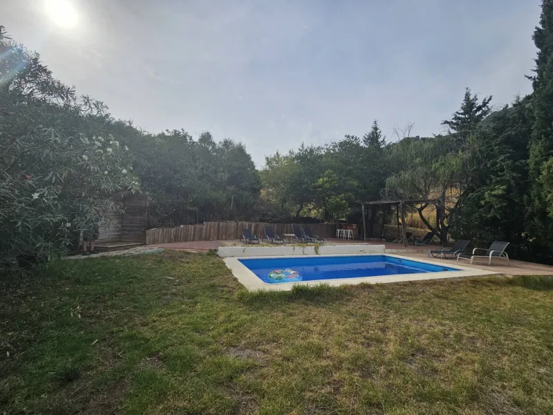 P> Exceptional and rare property just 27 km from the beaches of the  Costa del Sol. An ideal estate for equestrians, featuring a stable block, a spacious farmhouse , a cosy guest casita, and an additional building suitable for conversion into further acco