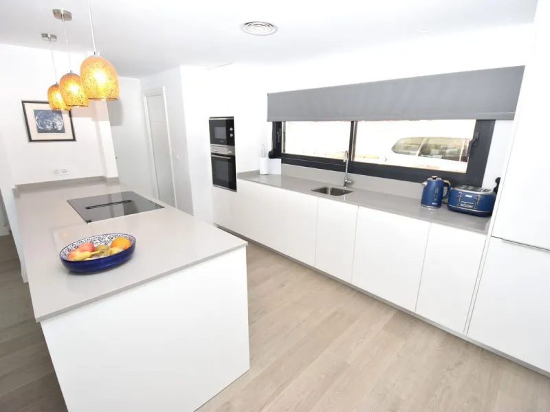 Fantastic, recently built apartment which is perfect for families who want to live in a spacious and comfortable home.  It consists of a generous living-dining room, fully fitted open plan kitchen, equipped with Bosch electrical appliances, 3 bedrooms, 2 