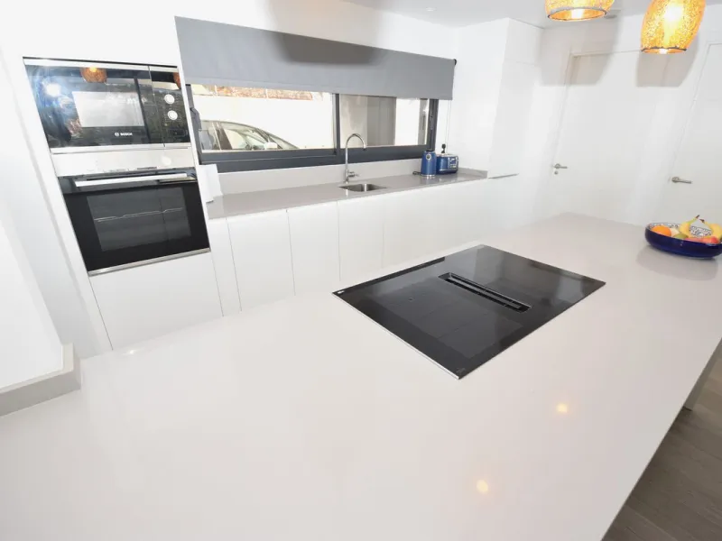 Fantastic, recently built apartment which is perfect for families who want to live in a spacious and comfortable home.  It consists of a generous living-dining room, fully fitted open plan kitchen, equipped with Bosch electrical appliances, 3 bedrooms, 2 