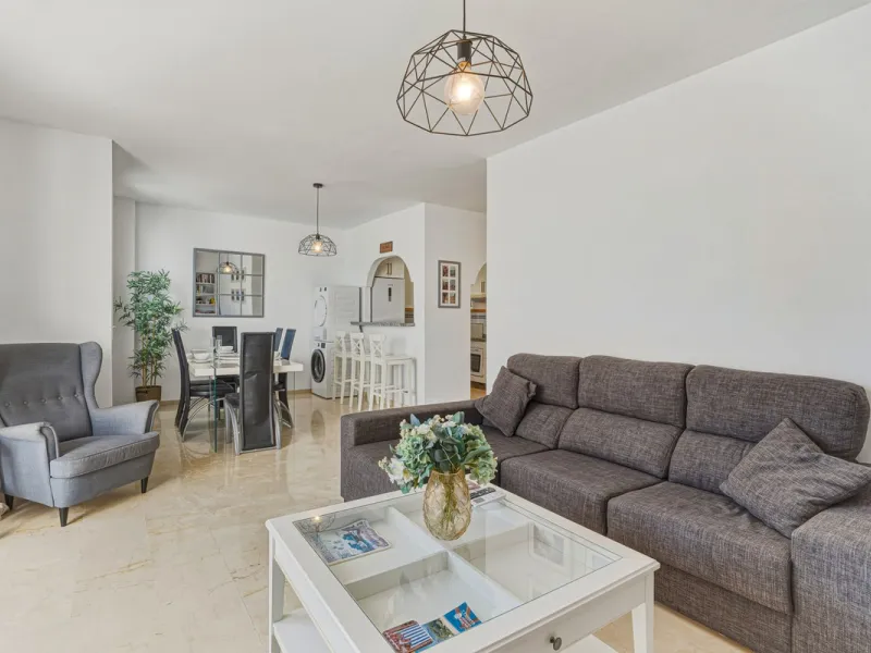 Situated in the sought-after area of Riviera del Sol, Mijas, this well-presented three-bedroom, two-bathroom first-floor apartment offers comfortable coastal living within walking distance of local amenities and the beach.