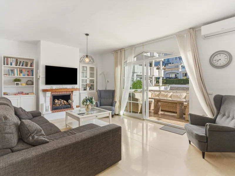 Situated in the sought-after area of Riviera del Sol, Mijas, this well-presented three-bedroom, two-bathroom first-floor apartment offers comfortable coastal living within walking distance of local amenities and the beach.