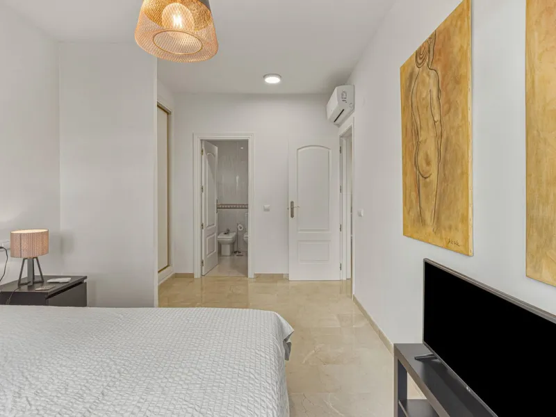 Situated in the sought-after area of Riviera del Sol, Mijas, this well-presented three-bedroom, two-bathroom first-floor apartment offers comfortable coastal living within walking distance of local amenities and the beach.