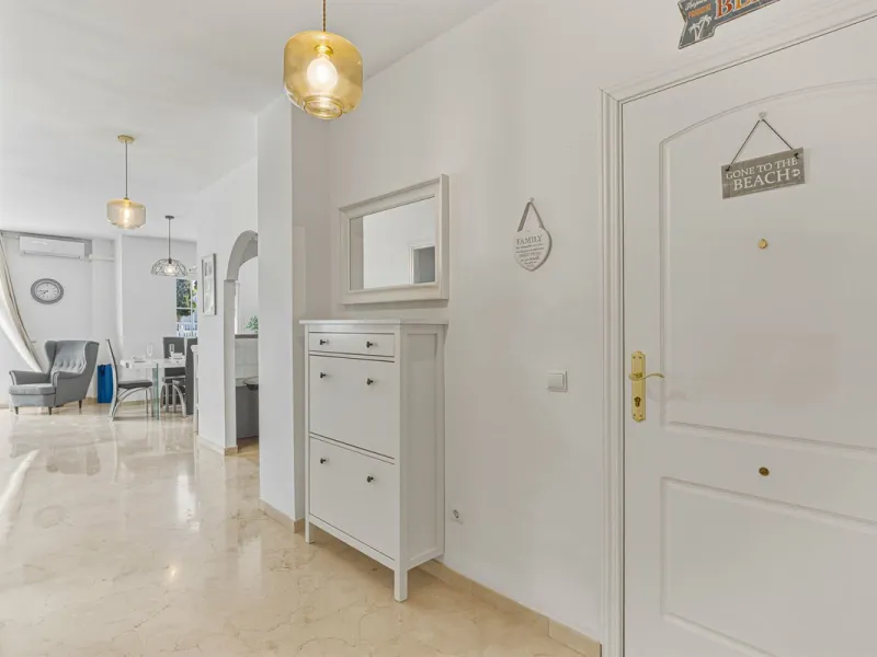 Situated in the sought-after area of Riviera del Sol, Mijas, this well-presented three-bedroom, two-bathroom first-floor apartment offers comfortable coastal living within walking distance of local amenities and the beach.