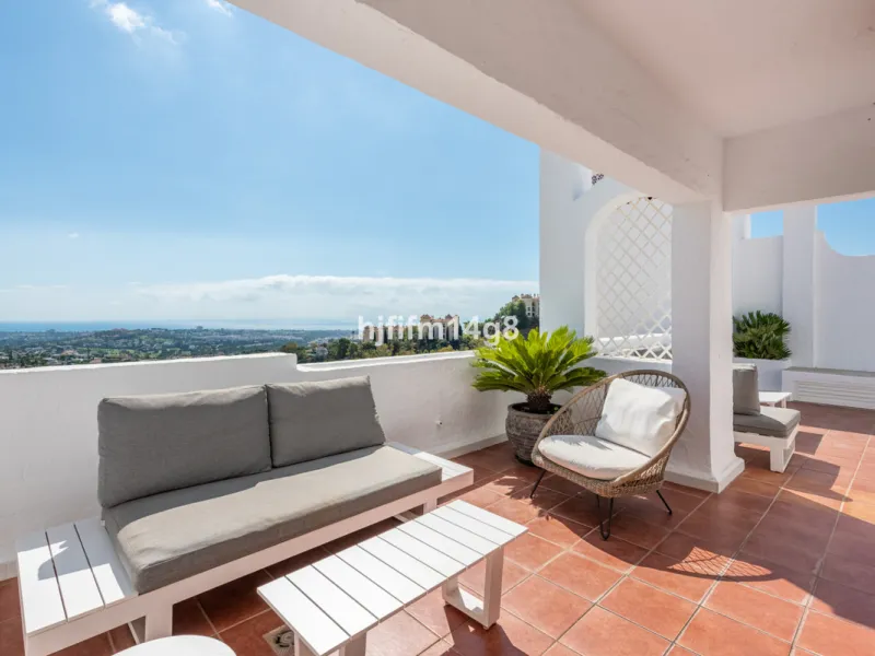 Discover a stunning apartment with the charm and feel of a townhouse in the exclusive Las Colinas de Marbella. This exceptional property, with a total of 241m² (152m² interior plus 89m² of terraces), combines space, natural light, and panoramic views, off