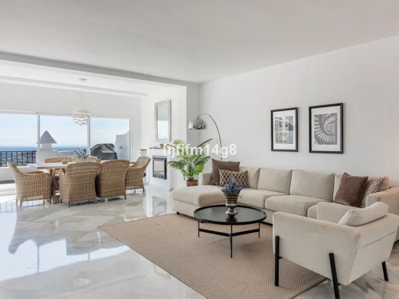 Discover a stunning apartment with the charm and feel of a townhouse in the exclusive Las Colinas de Marbella. This exceptional property, with a total of 241m² (152m² interior plus 89m² of terraces), combines space, natural light, and panoramic views, off