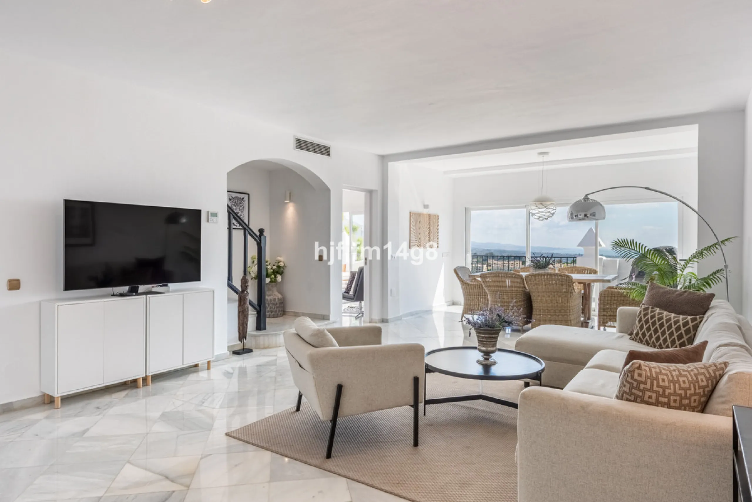 Discover a stunning apartment with the charm and feel of a townhouse in the exclusive Las Colinas de Marbella. This exceptional property, with a total of 241m² (152m² interior plus 89m² of terraces), combines space, natural light, and panoramic views, off