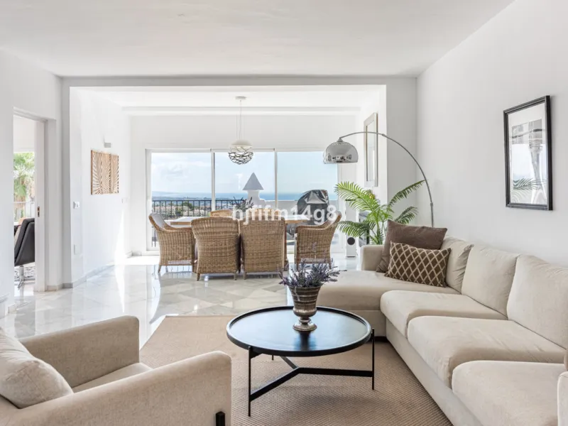 Discover a stunning apartment with the charm and feel of a townhouse in the exclusive Las Colinas de Marbella. This exceptional property, with a total of 241m² (152m² interior plus 89m² of terraces), combines space, natural light, and panoramic views, off