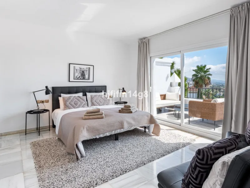 Discover a stunning apartment with the charm and feel of a townhouse in the exclusive Las Colinas de Marbella. This exceptional property, with a total of 241m² (152m² interior plus 89m² of terraces), combines space, natural light, and panoramic views, off