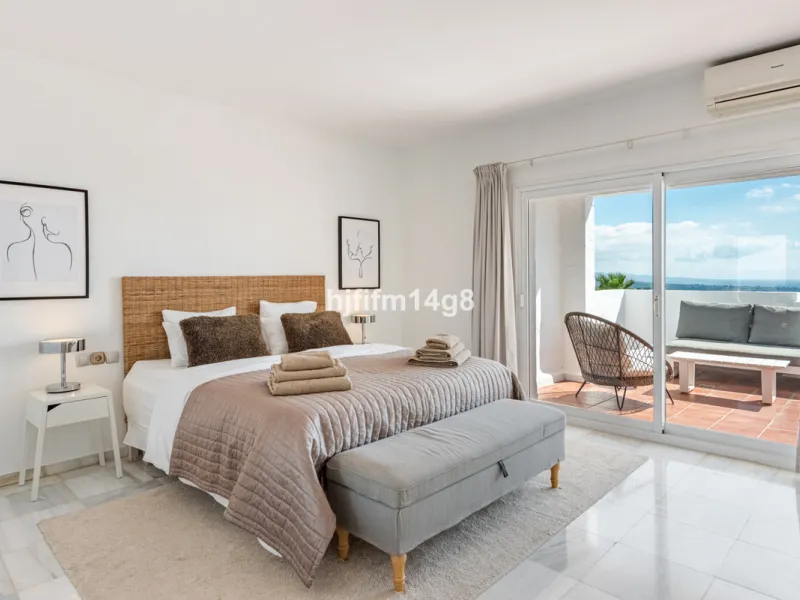 Discover a stunning apartment with the charm and feel of a townhouse in the exclusive Las Colinas de Marbella. This exceptional property, with a total of 241m² (152m² interior plus 89m² of terraces), combines space, natural light, and panoramic views, off