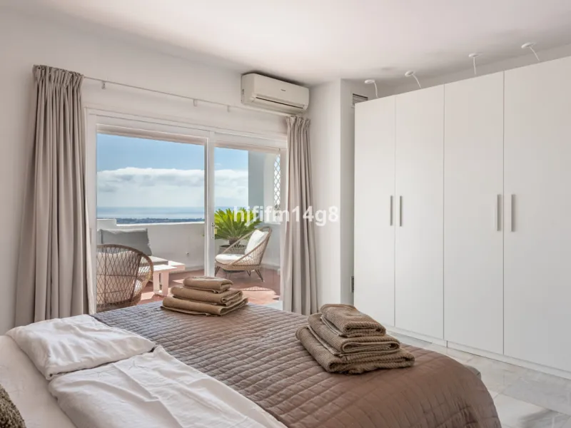 Discover a stunning apartment with the charm and feel of a townhouse in the exclusive Las Colinas de Marbella. This exceptional property, with a total of 241m² (152m² interior plus 89m² of terraces), combines space, natural light, and panoramic views, off