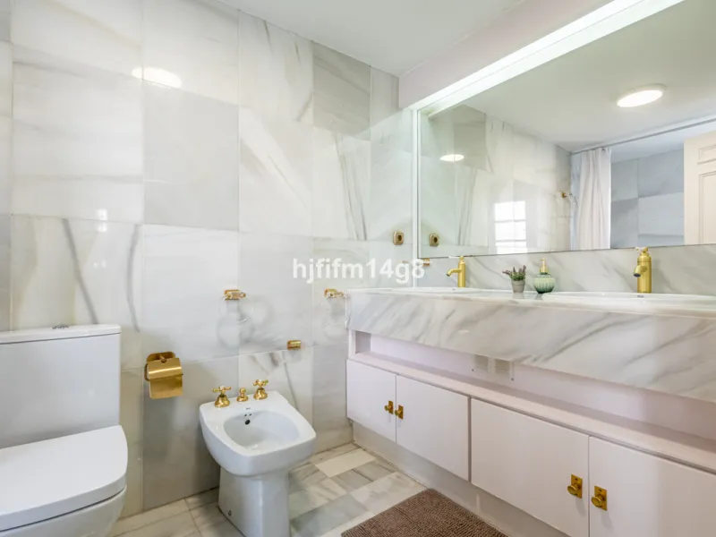 Discover a stunning apartment with the charm and feel of a townhouse in the exclusive Las Colinas de Marbella. This exceptional property, with a total of 241m² (152m² interior plus 89m² of terraces), combines space, natural light, and panoramic views, off