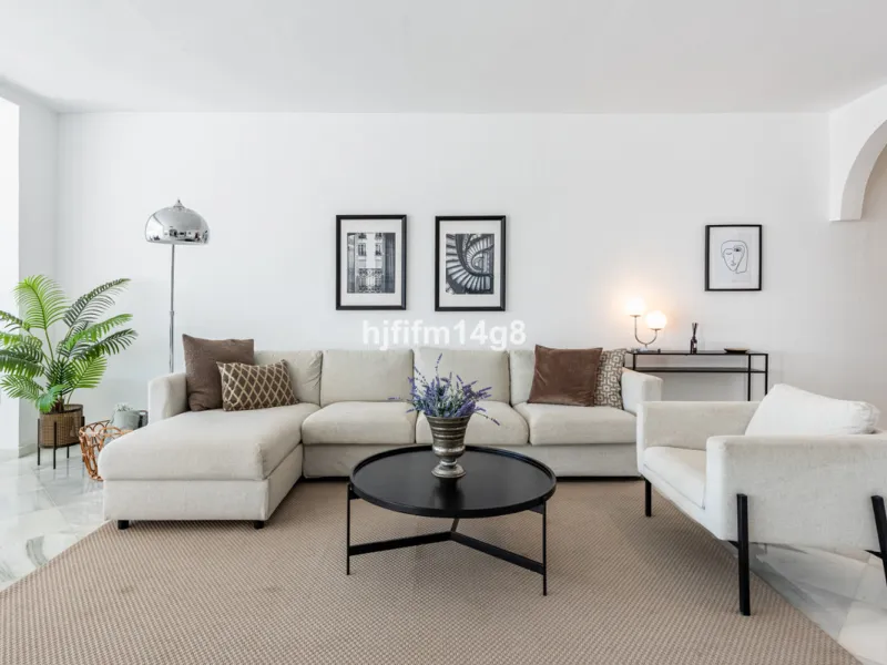 Discover a stunning apartment with the charm and feel of a townhouse in the exclusive Las Colinas de Marbella. This exceptional property, with a total of 241m² (152m² interior plus 89m² of terraces), combines space, natural light, and panoramic views, off