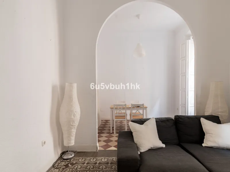 Located on Calle Císter, one of Málaga's most prestigious and sought-after streets — directly beside the iconic Cathedral — this spacious apartment offers a rare opportunity to acquire a property of character in the very heart of the historic centre.
