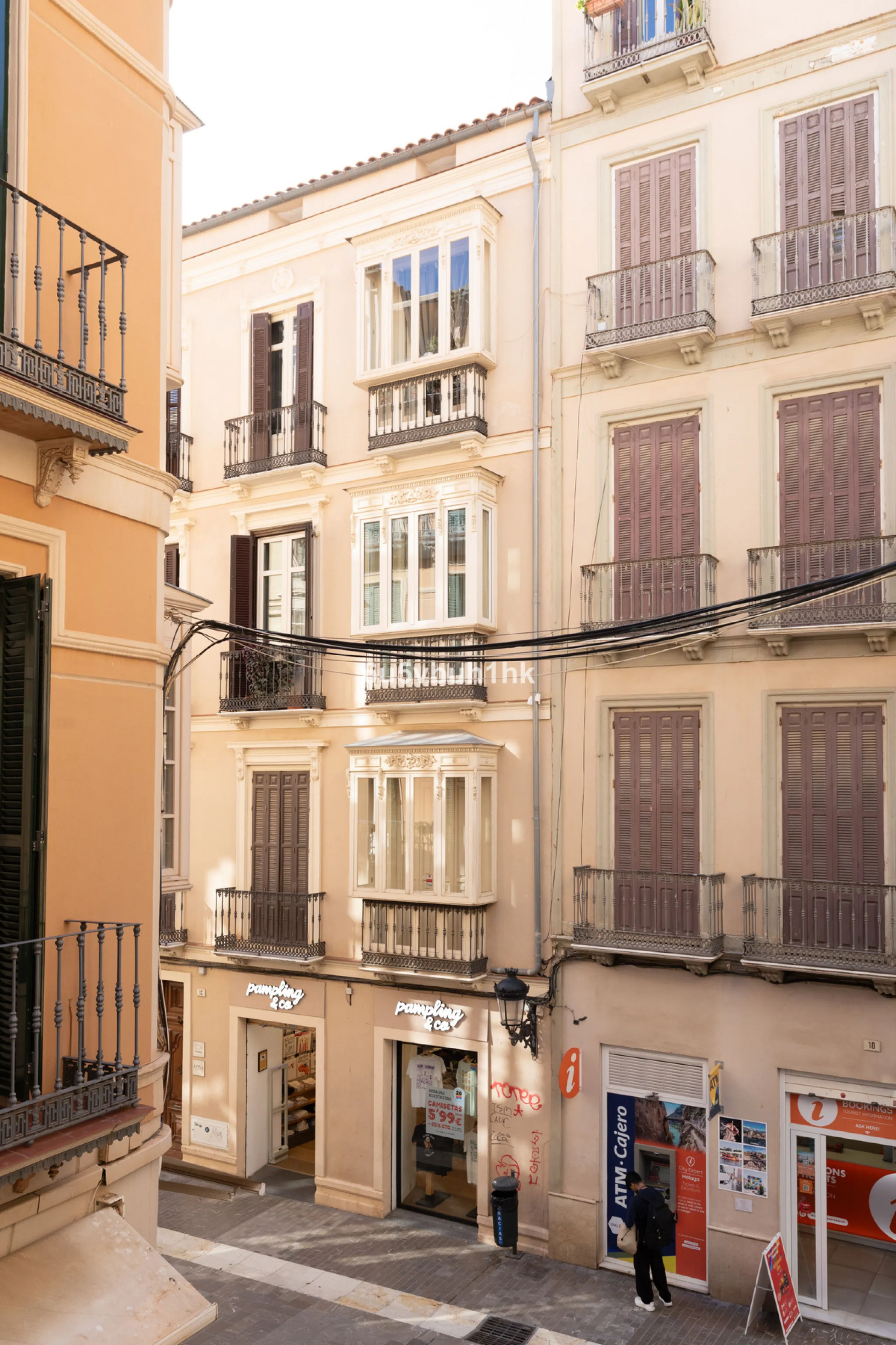 Located on Calle Císter, one of Málaga's most prestigious and sought-after streets — directly beside the iconic Cathedral — this spacious apartment offers a rare opportunity to acquire a property of character in the very heart of the historic centre.