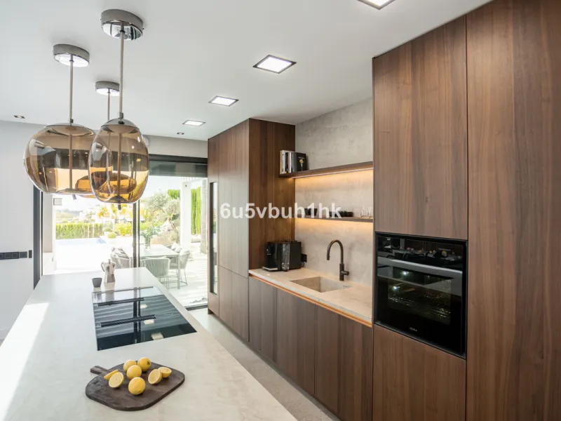 Located in the exclusive and secure community of Resina Golf in Estepona, this fully renovated villa offers an exceptional standard of luxury living. With meticulous attention to detail and high-end finishes throughout, the property combines contemporary 