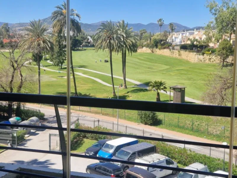 Bright apartment with golf course, garden, and pool views in a gated community!
