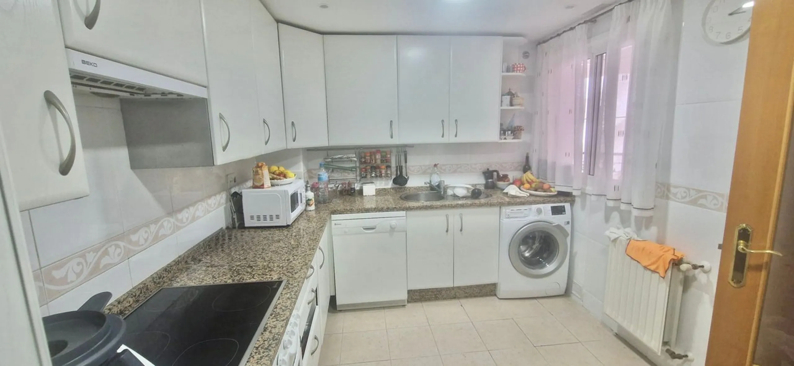 Bright apartment with golf course, garden, and pool views in a gated community!