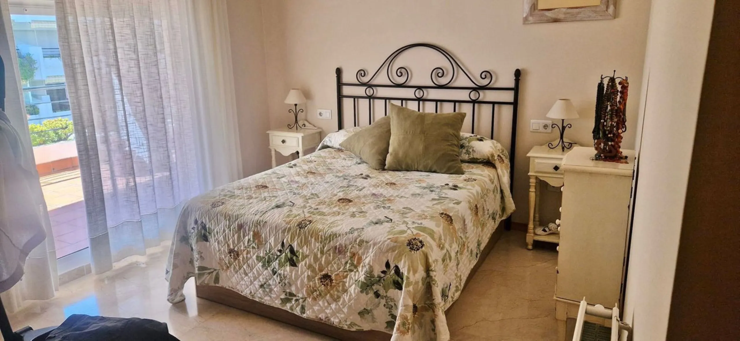 Bright apartment with golf course, garden, and pool views in a gated community!
