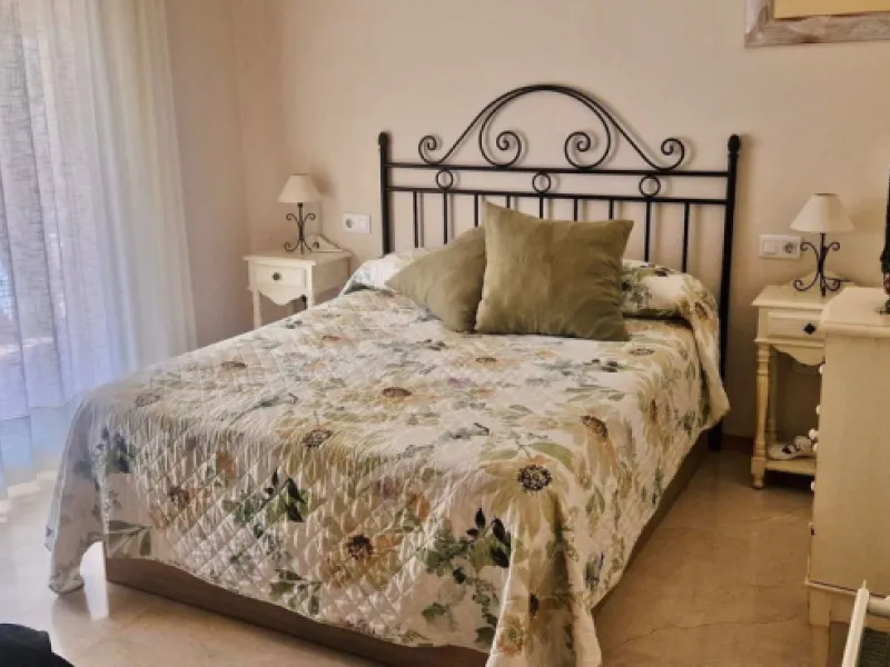 Bright apartment with golf course, garden, and pool views in a gated community!