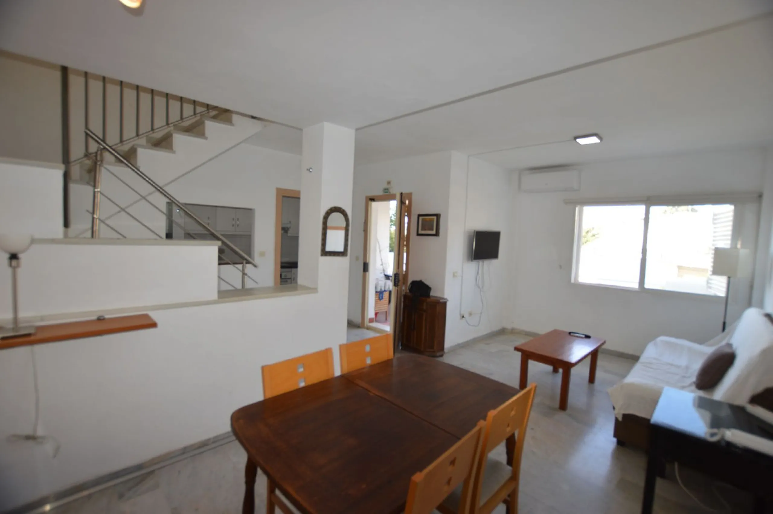 Discover the duplex of your dreams in Torreblanca! This charming 122 m² home offers you a cozy and modern space, ready to move into. With two spacious bedrooms and two bathrooms, you will find the comfort you have always wanted. The illuminated terrace, f