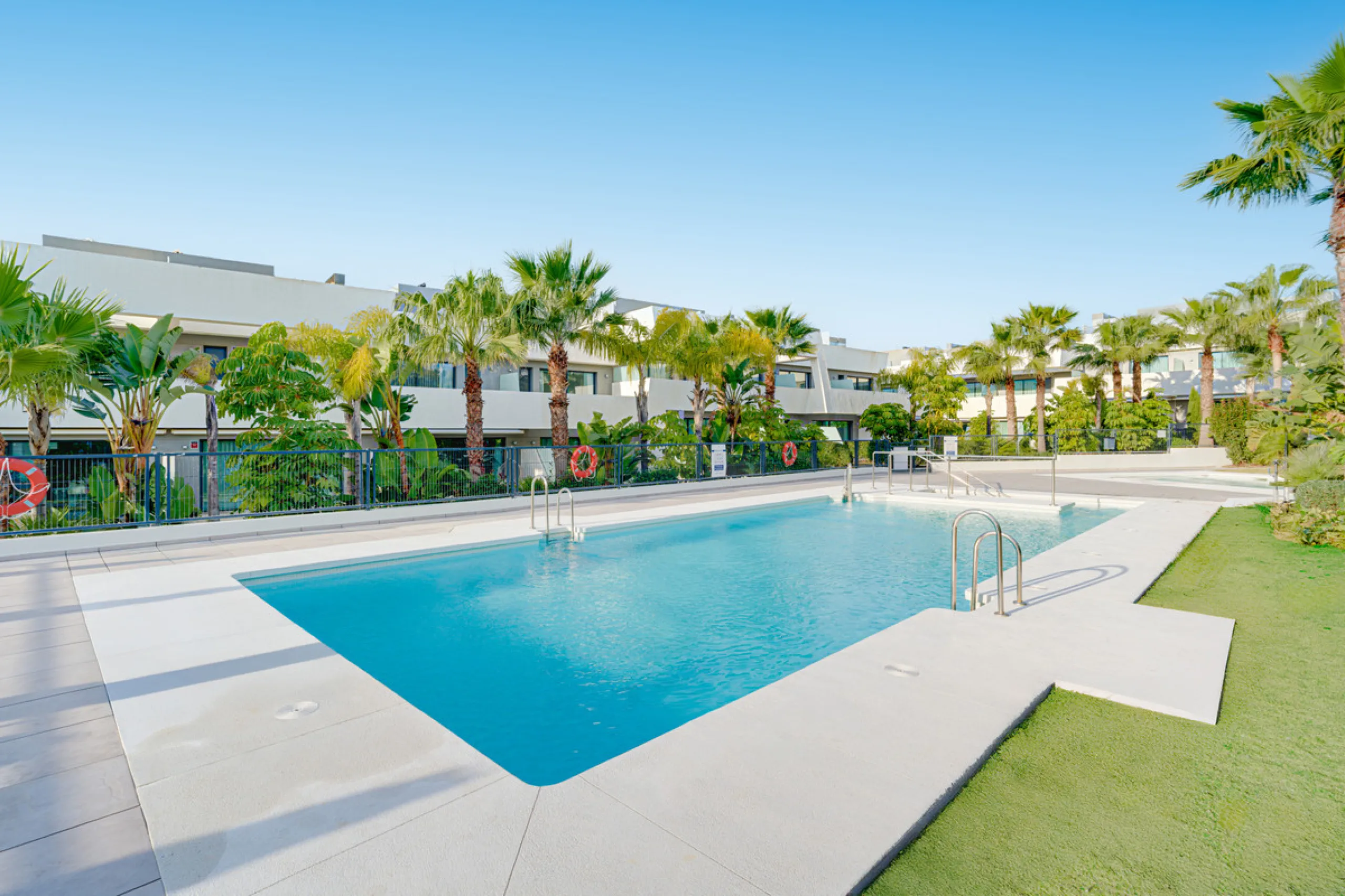 Exceptional four-bedroom townhouse located in an exclusive boutique development of just 48 contemporary luxury townhouses, set on an elevated plot in La Cala de Mijas. The gated community is surrounded by beautifully landscaped tropical gardens and offers