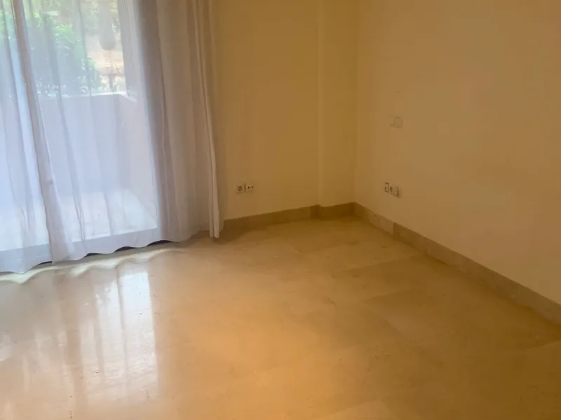 Located within the exclusive Gran Bahía Marbella development, this spacious ground-floor apartment offers refined coastal living just steps from the beach.