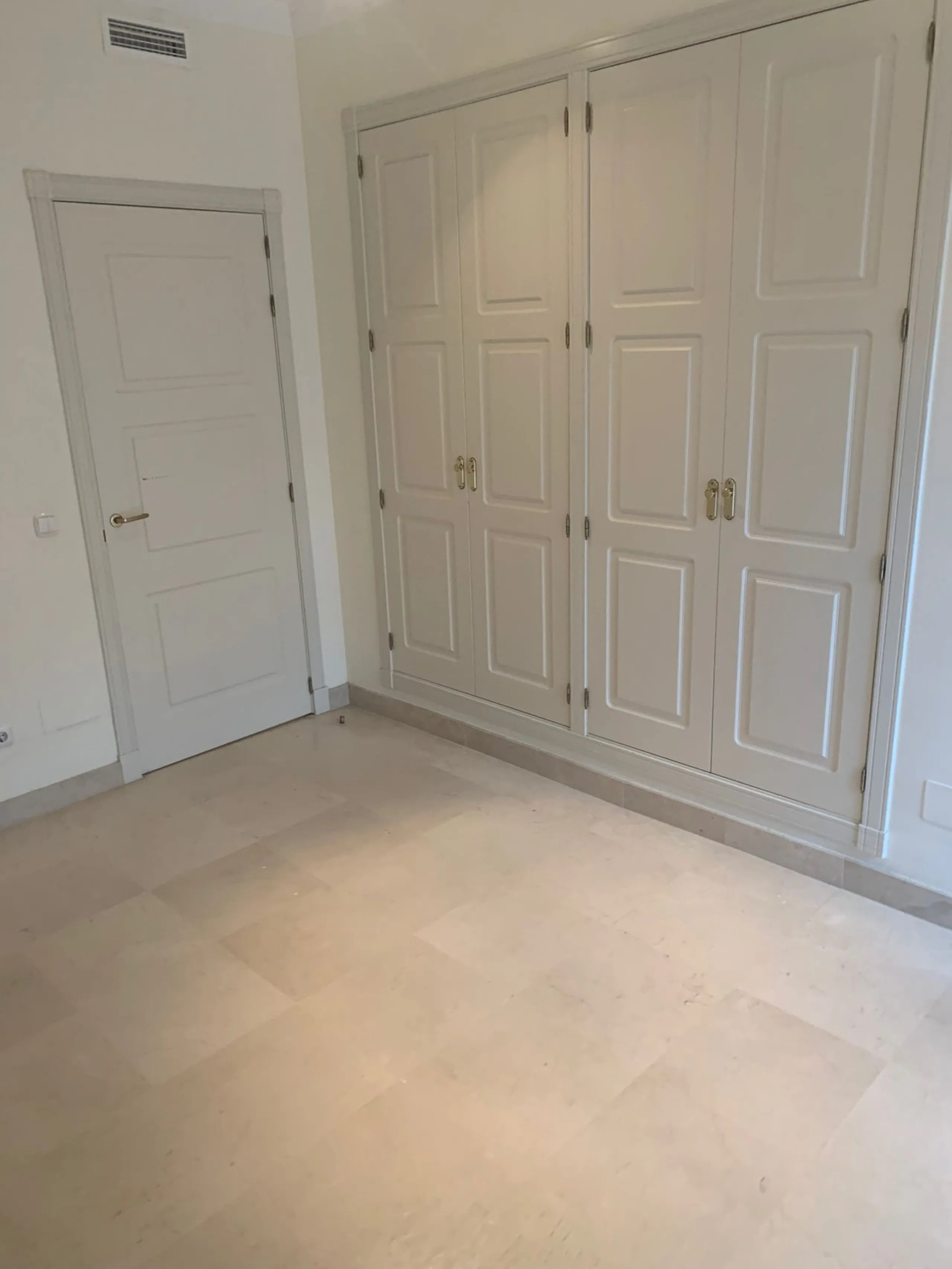 Located within the exclusive Gran Bahía Marbella development, this spacious ground-floor apartment offers refined coastal living just steps from the beach.