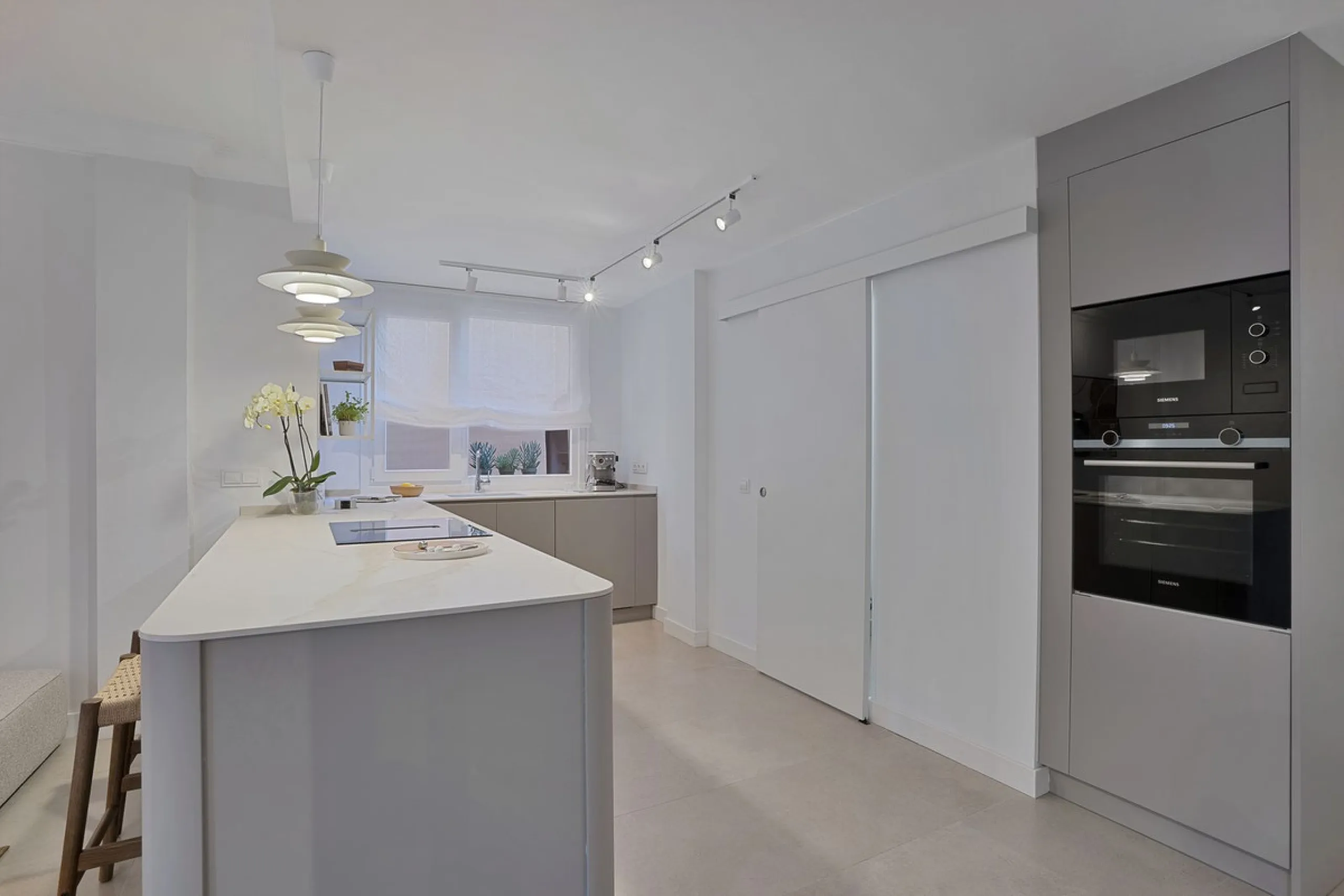 Bright and modern 2-room apartments with high ceilings, filled with sunlight and a sense of space.