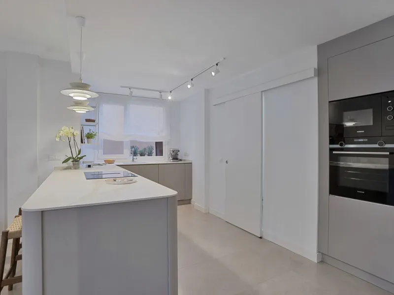 Bright and modern 2-room apartments with high ceilings, filled with sunlight and a sense of space.
