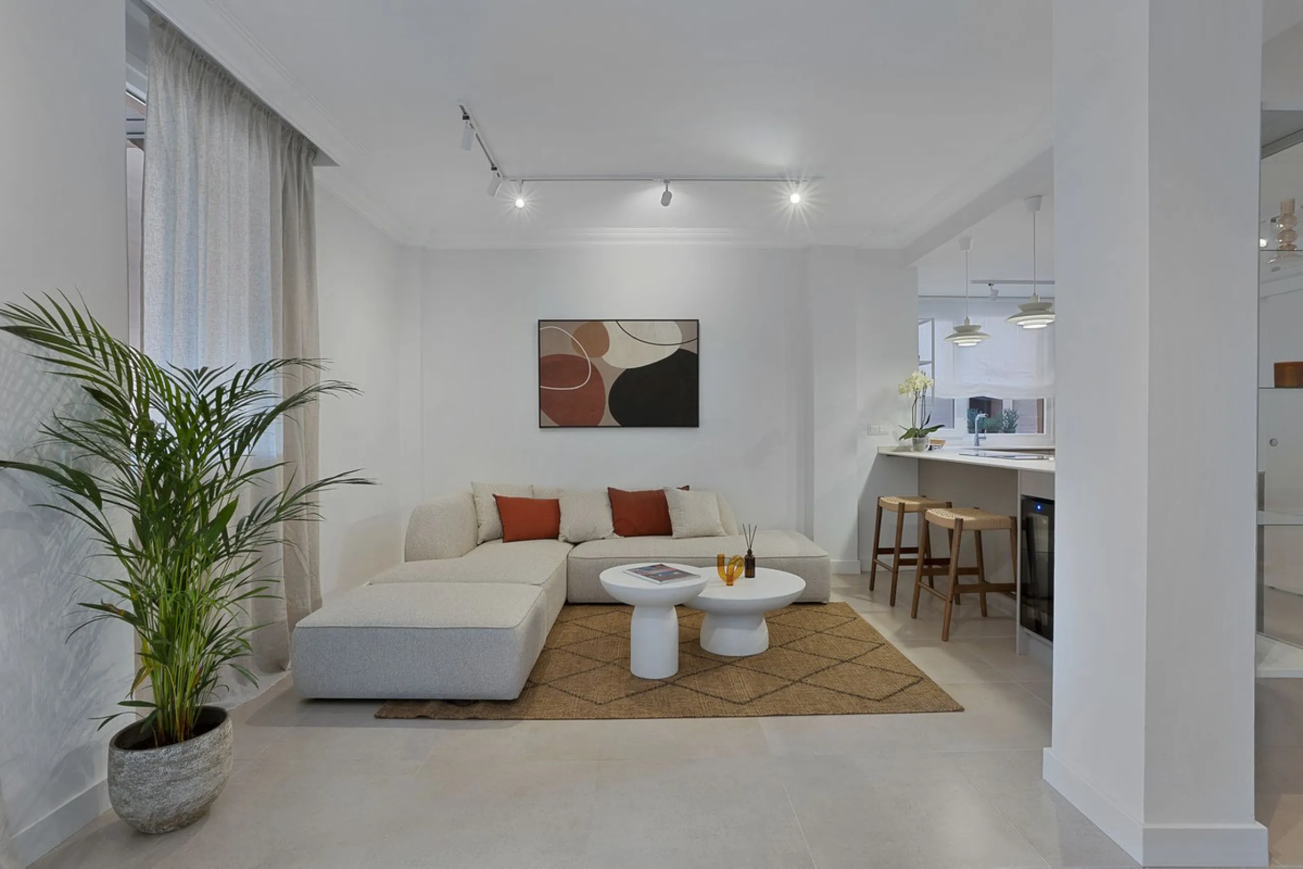 Bright and modern 2-room apartments with high ceilings, filled with sunlight and a sense of space.