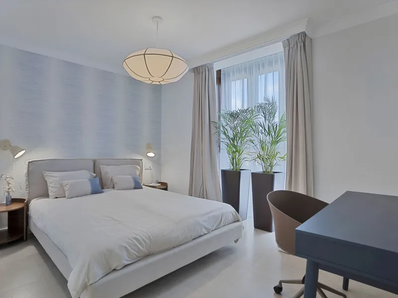 Bright and modern 2-room apartments with high ceilings, filled with sunlight and a sense of space.