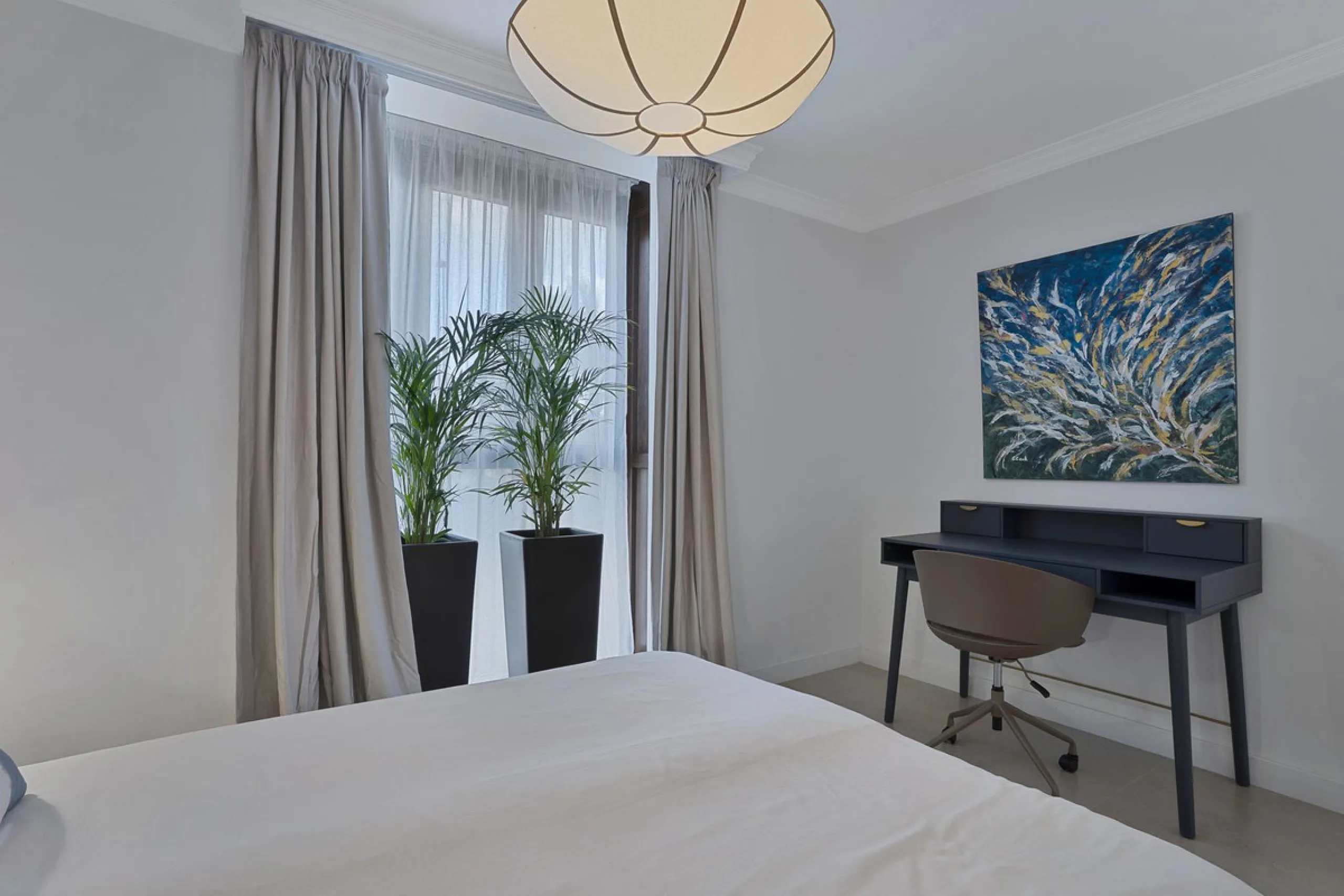 Bright and modern 2-room apartments with high ceilings, filled with sunlight and a sense of space.