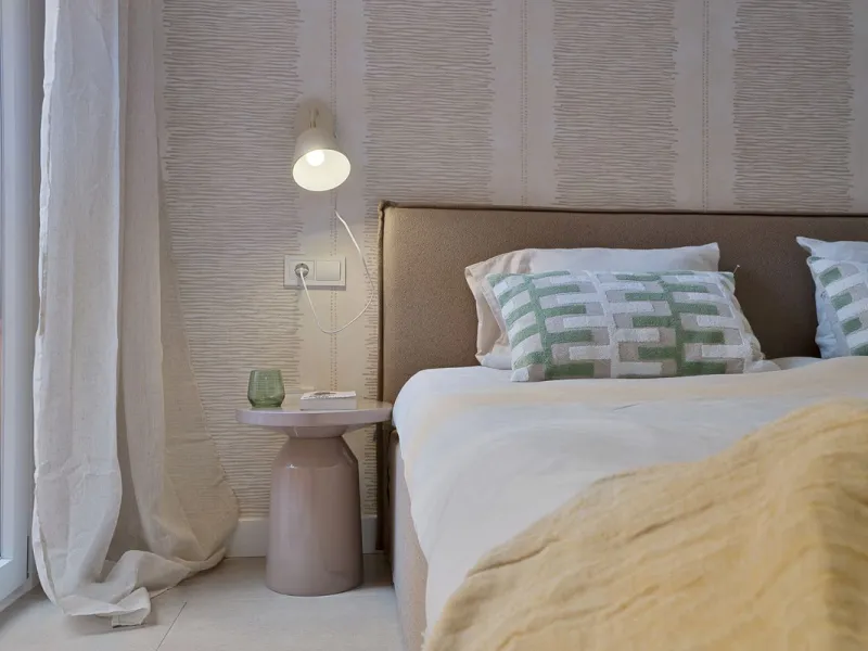 Bright and modern 2-room apartments with high ceilings, filled with sunlight and a sense of space.