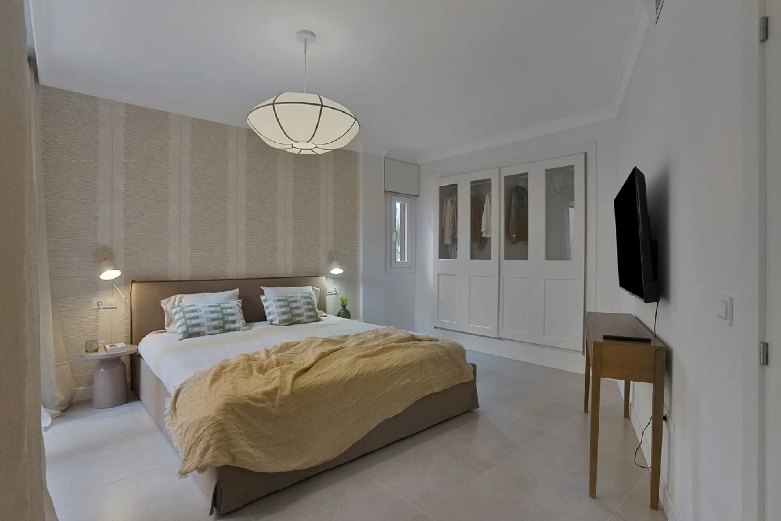 Bright and modern 2-room apartments with high ceilings, filled with sunlight and a sense of space.