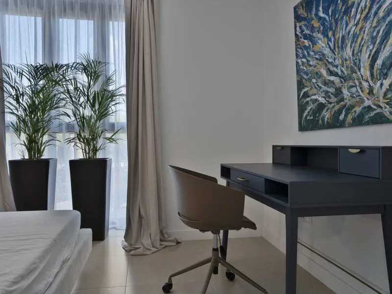 Bright and modern 2-room apartments with high ceilings, filled with sunlight and a sense of space.