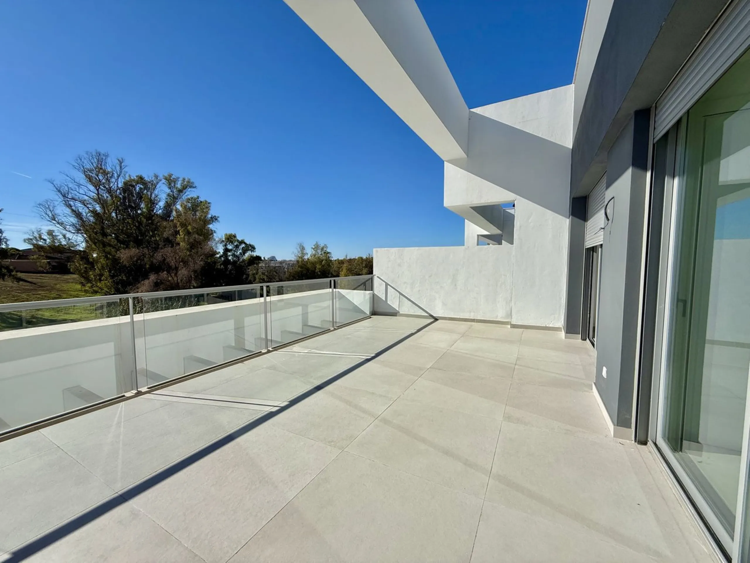 This stunning semi-detached house is located in the exclusive  community in Guadalmina Alta Marbella, just minutes from San Pedro de Alcántara. With a private communal pool and gym, Treetops offers privacy, security, and a privileged setting near the Guad
