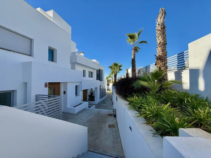 This stunning semi-detached house is located in the exclusive  community in Guadalmina Alta Marbella, just minutes from San Pedro de Alcántara. With a private communal pool and gym, Treetops offers privacy, security, and a privileged setting near the Guad