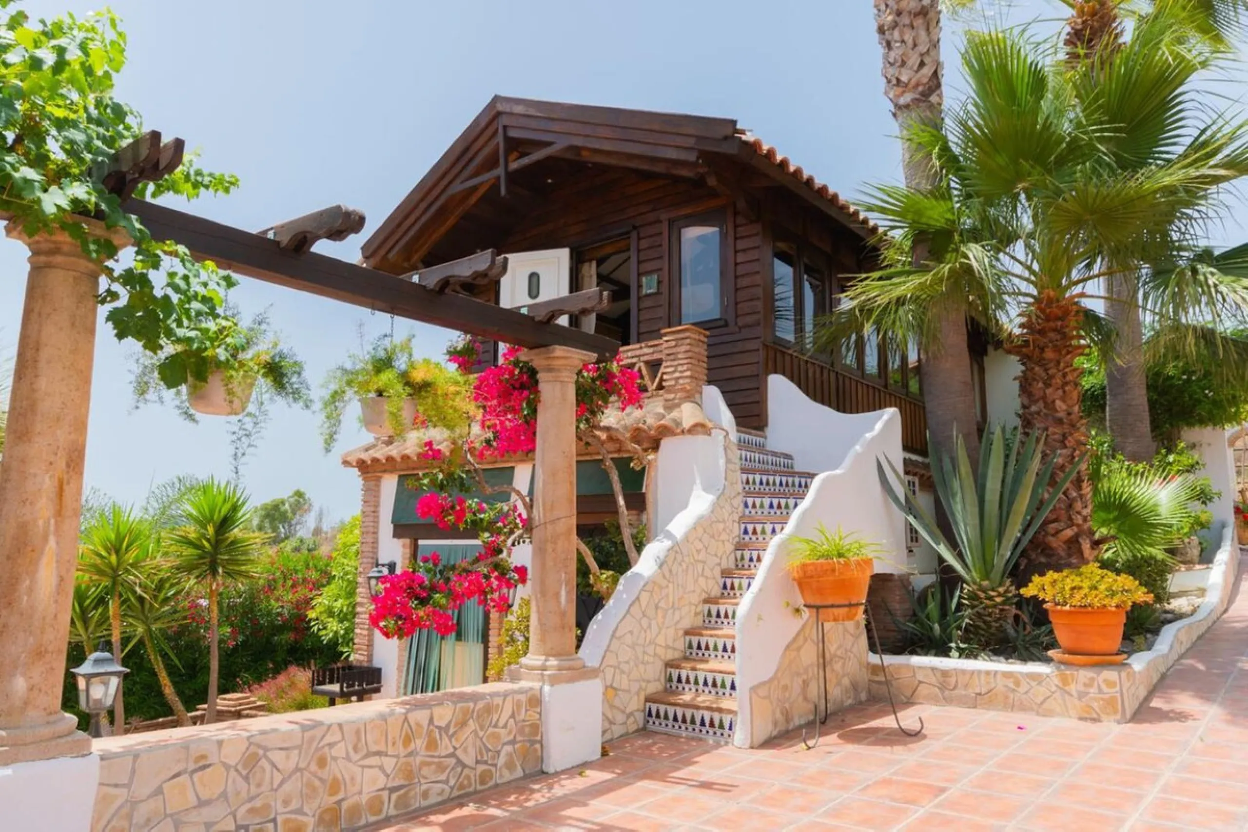 A rare opportunity to own a truly enchanting estate near the picturesque Mijas Pueblo. Set on an expansive 16,000 m² plot, this gated property offers breathtaking panoramic views surrounded by fruit trees, almond trees, and olive groves, creating a peacef