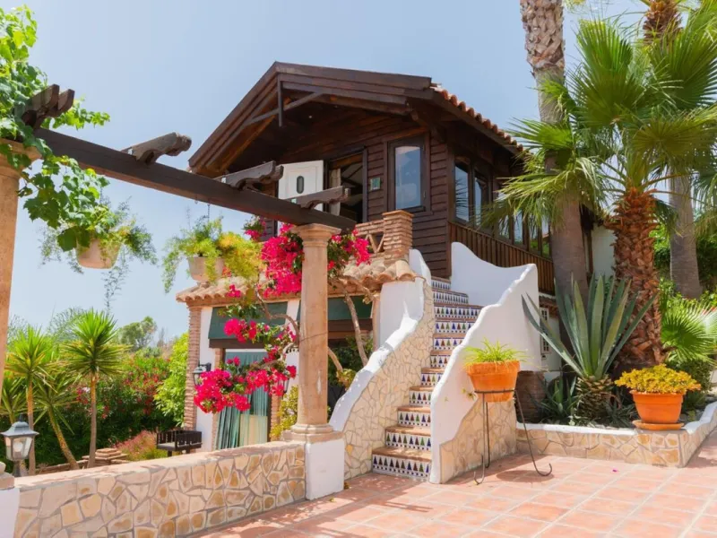A rare opportunity to own a truly enchanting estate near the picturesque Mijas Pueblo. Set on an expansive 16,000 m² plot, this gated property offers breathtaking panoramic views surrounded by fruit trees, almond trees, and olive groves, creating a peacef