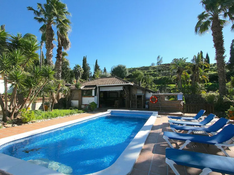 A rare opportunity to own a truly enchanting estate near the picturesque Mijas Pueblo. Set on an expansive 16,000 m² plot, this gated property offers breathtaking panoramic views surrounded by fruit trees, almond trees, and olive groves, creating a peacef