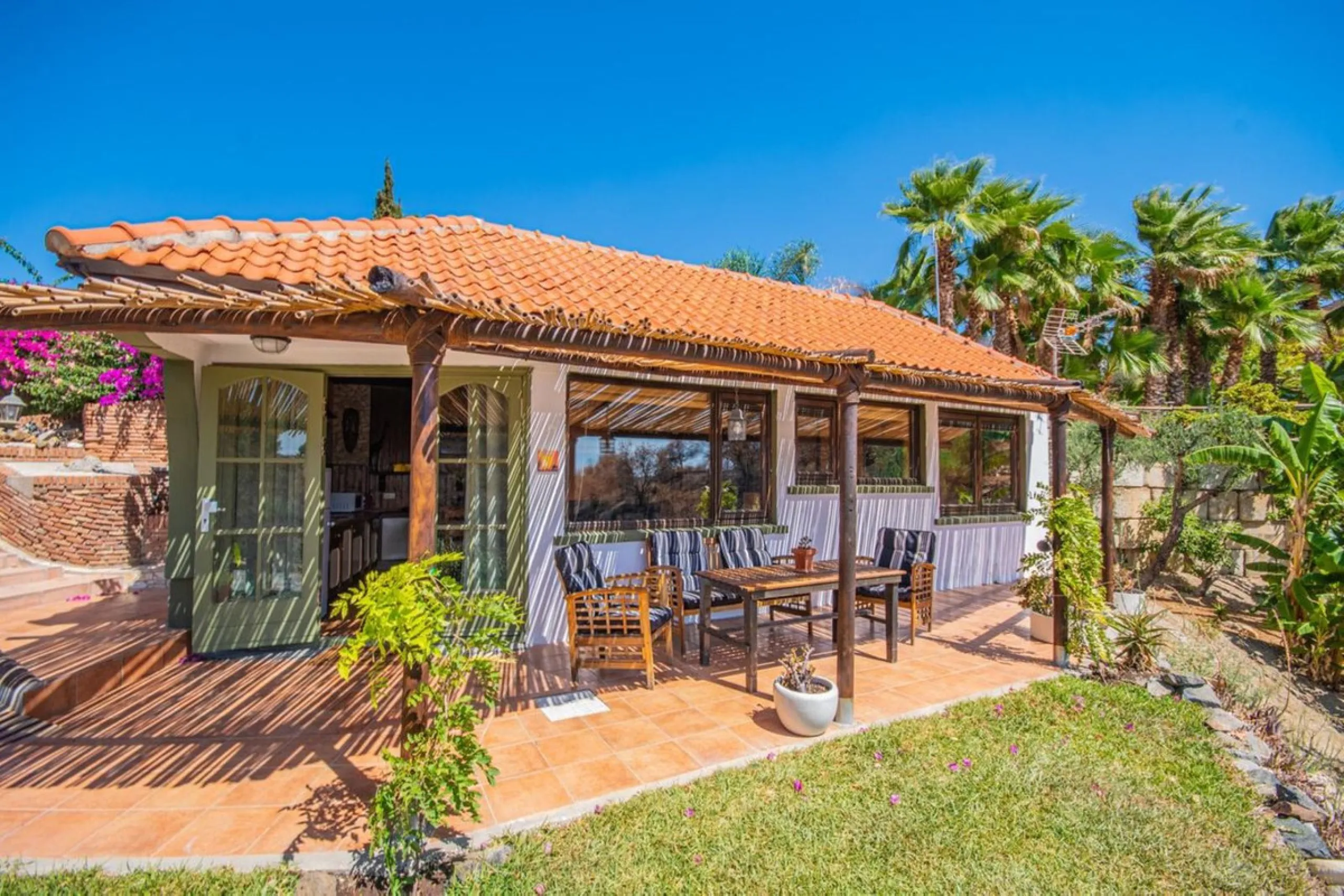 A rare opportunity to own a truly enchanting estate near the picturesque Mijas Pueblo. Set on an expansive 16,000 m² plot, this gated property offers breathtaking panoramic views surrounded by fruit trees, almond trees, and olive groves, creating a peacef