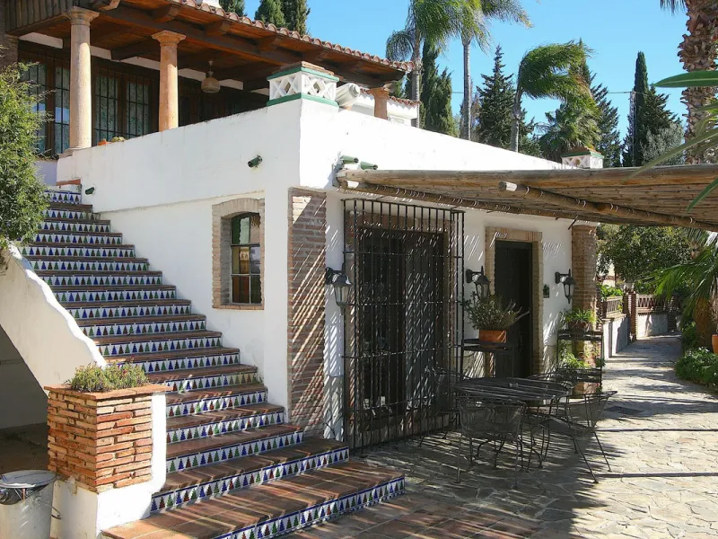 A rare opportunity to own a truly enchanting estate near the picturesque Mijas Pueblo. Set on an expansive 16,000 m² plot, this gated property offers breathtaking panoramic views surrounded by fruit trees, almond trees, and olive groves, creating a peacef