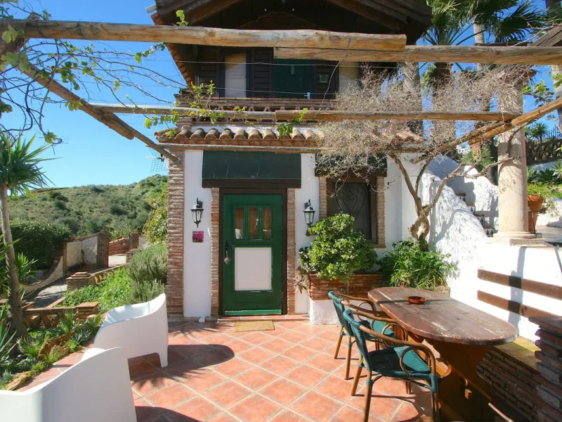 A rare opportunity to own a truly enchanting estate near the picturesque Mijas Pueblo. Set on an expansive 16,000 m² plot, this gated property offers breathtaking panoramic views surrounded by fruit trees, almond trees, and olive groves, creating a peacef