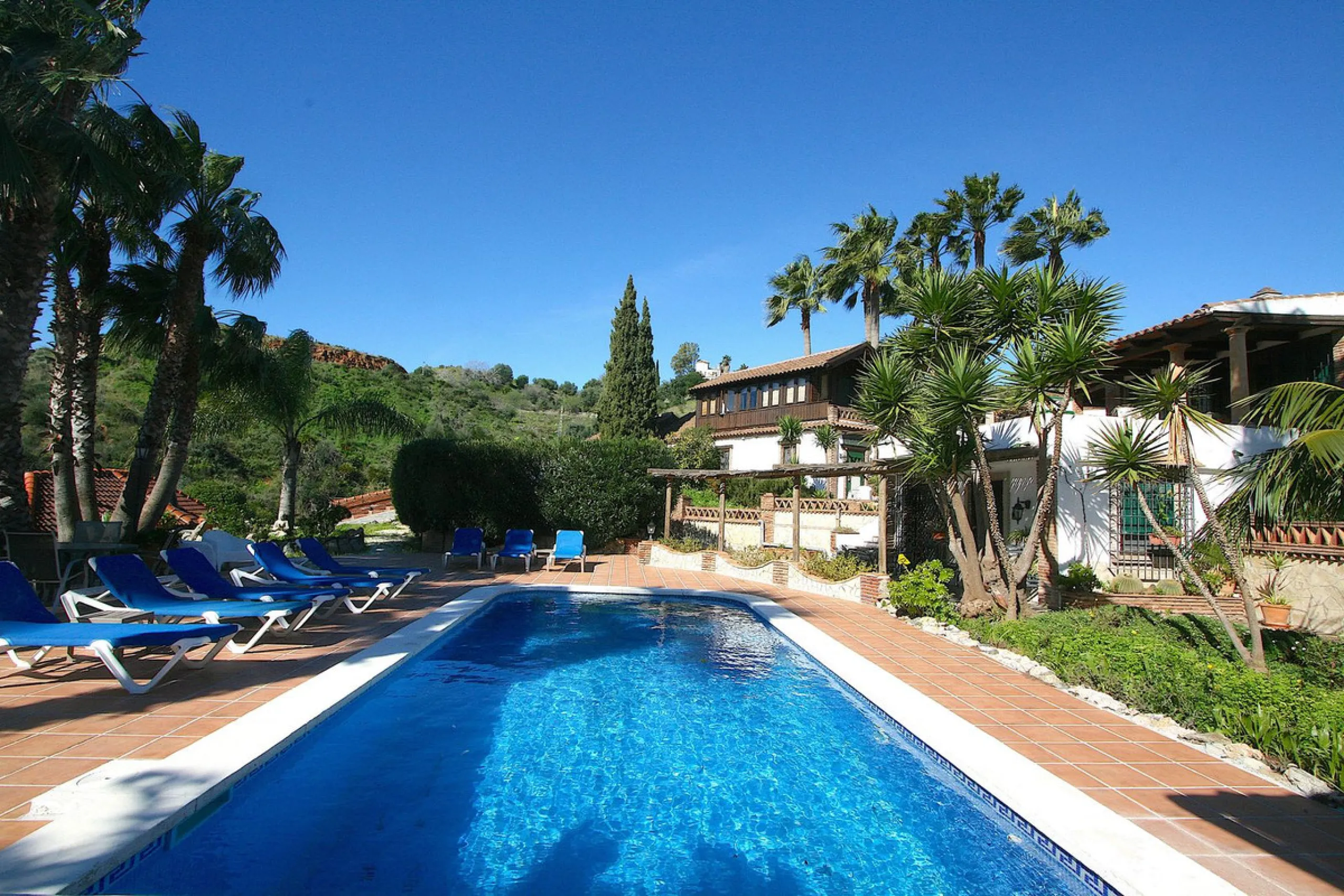 A rare opportunity to own a truly enchanting estate near the picturesque Mijas Pueblo. Set on an expansive 16,000 m² plot, this gated property offers breathtaking panoramic views surrounded by fruit trees, almond trees, and olive groves, creating a peacef