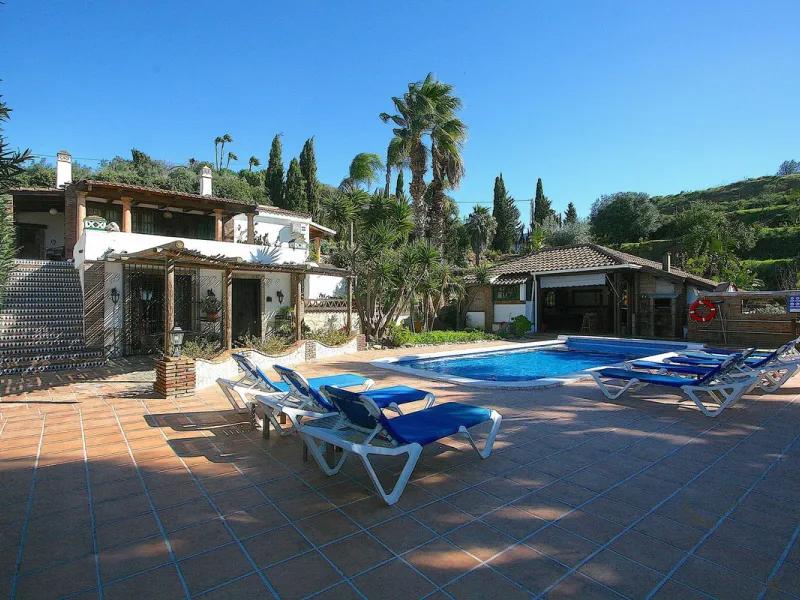 A rare opportunity to own a truly enchanting estate near the picturesque Mijas Pueblo. Set on an expansive 16,000 m² plot, this gated property offers breathtaking panoramic views surrounded by fruit trees, almond trees, and olive groves, creating a peacef