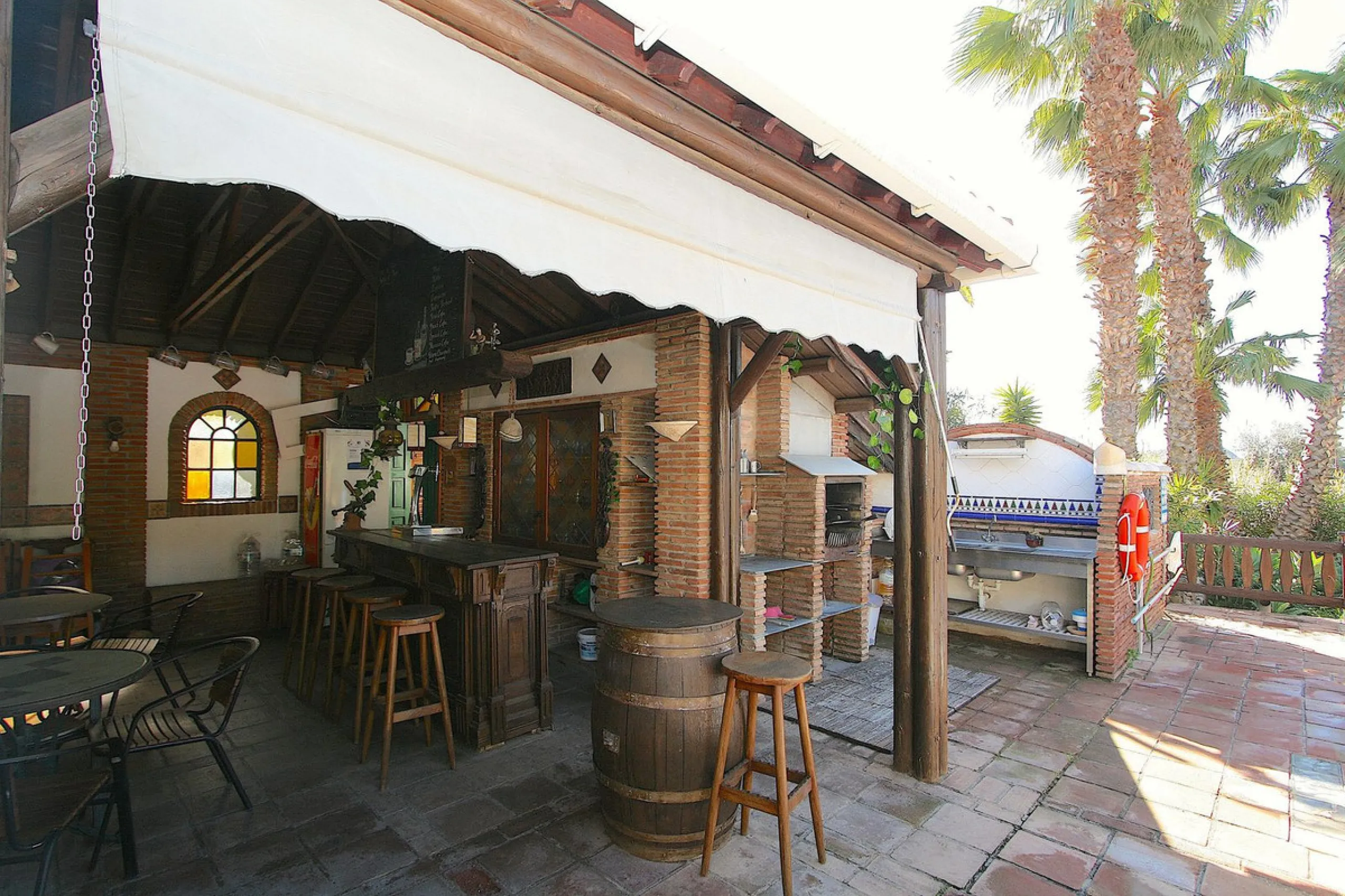 A rare opportunity to own a truly enchanting estate near the picturesque Mijas Pueblo. Set on an expansive 16,000 m² plot, this gated property offers breathtaking panoramic views surrounded by fruit trees, almond trees, and olive groves, creating a peacef
