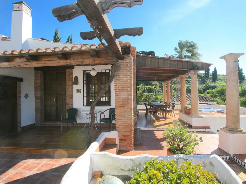A rare opportunity to own a truly enchanting estate near the picturesque Mijas Pueblo. Set on an expansive 16,000 m² plot, this gated property offers breathtaking panoramic views surrounded by fruit trees, almond trees, and olive groves, creating a peacef