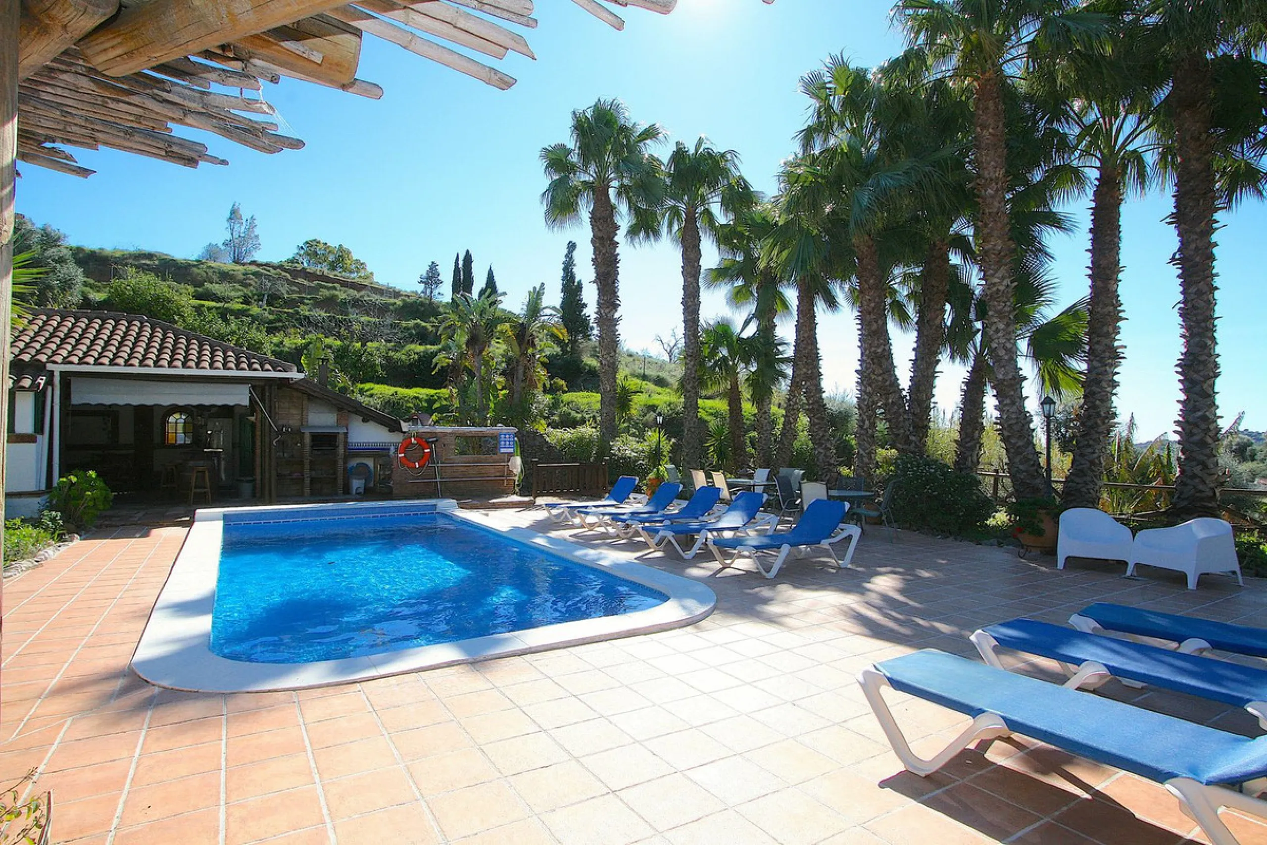A rare opportunity to own a truly enchanting estate near the picturesque Mijas Pueblo. Set on an expansive 16,000 m² plot, this gated property offers breathtaking panoramic views surrounded by fruit trees, almond trees, and olive groves, creating a peacef